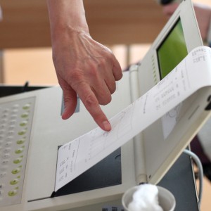 Image of doctor using testing machine