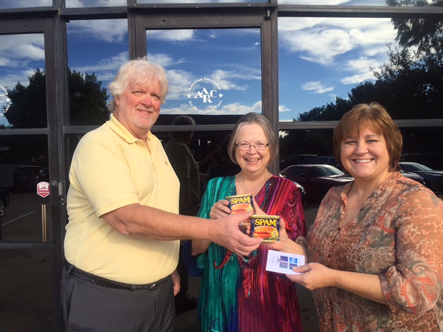 Steve Nelson presents Karen Singleterry and Sherry Milligan with the 'SPAM Award'