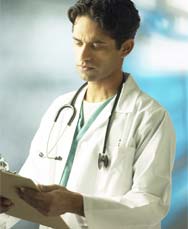 Image of doctor looking at clipboard