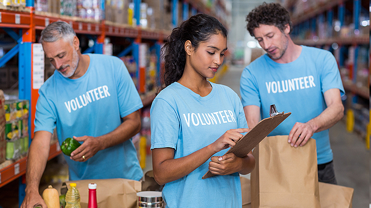 Image of people volunteering at food bank