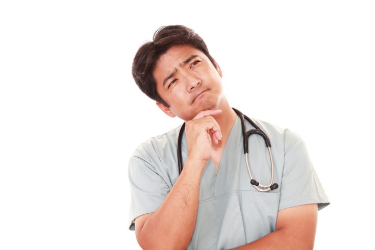 Image of a medical professional with a pondering expression