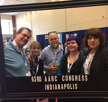 Manya Kanavalov (right) and colleagues stop for a photo op at Congress 2017