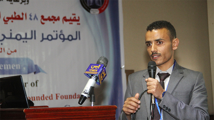 photo of Saleem Hamilah speaking at celebration event