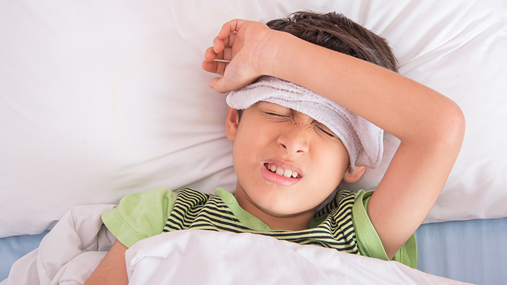 image of boy with fever
