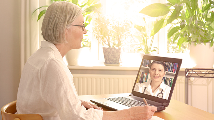 image of woman seeking medical advice through telehealth