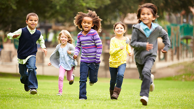 image of children running in park