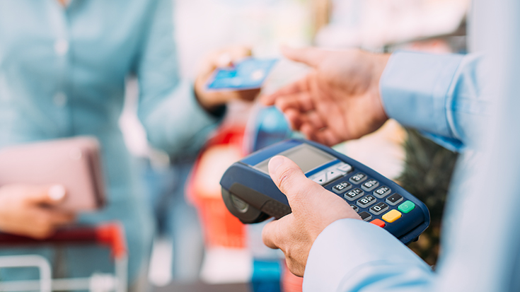 image of woman making a purchase