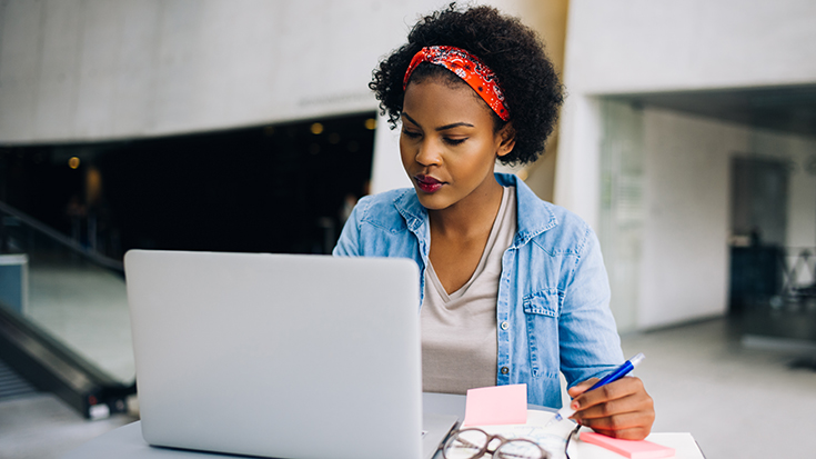 image of woman working on laptop