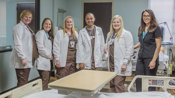 Tina Siddon, far right, is helping her students transition to bachelor’s degree completion programs.