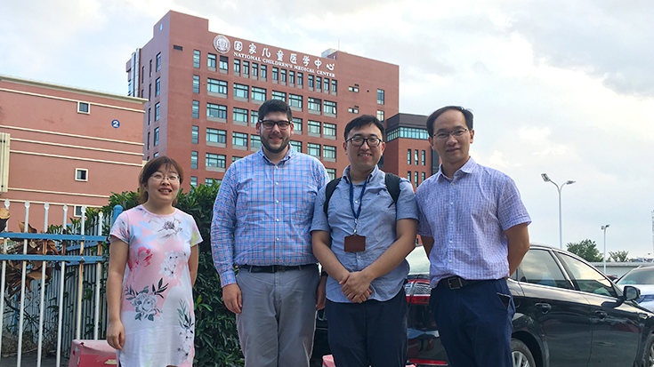 Photo of Ryan Sharkey (second from left) with colleagues in China