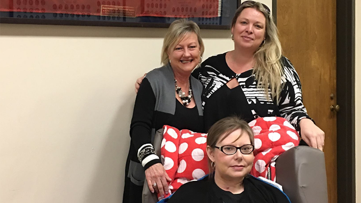 photo of Loftin with her aunt and a patient