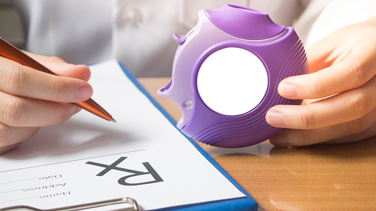 image of doctor writing asthma medication prescription