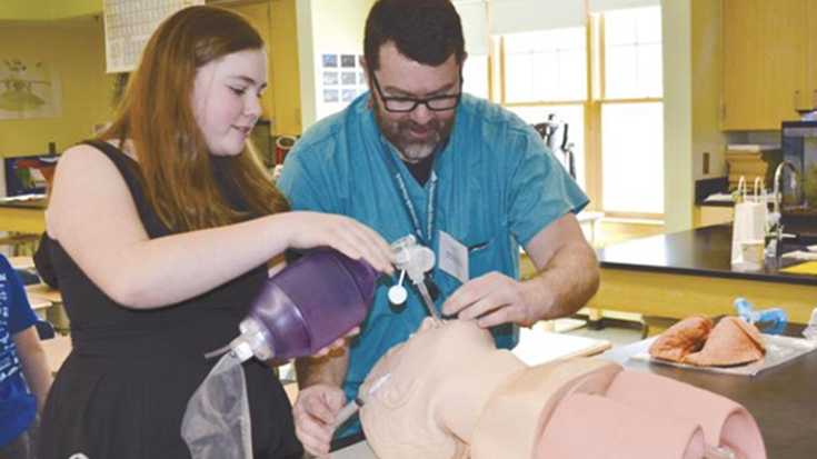 Good Press: Matthew McNally, RRT, leads a demonstration at a local middle/high school career week event.