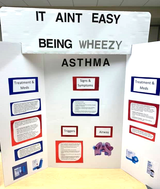 photo of scholarship application board discussing asthma