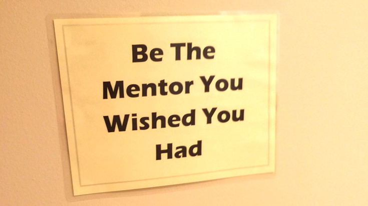 image of a sign that reads Be the mentor you wished you had