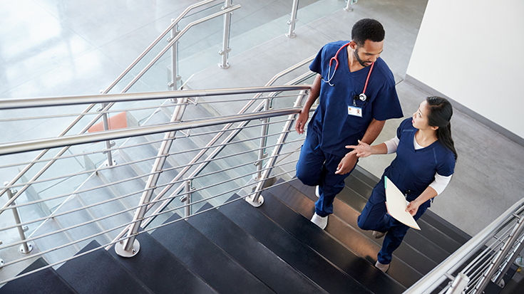 Image of two nurses talking 