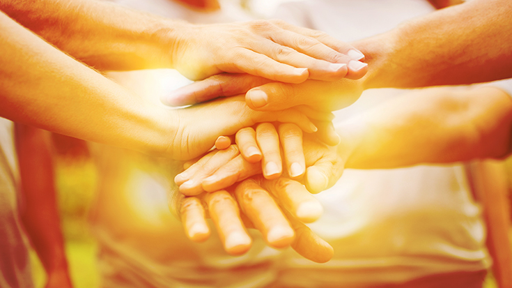 image of hands in center for a go team cheer
