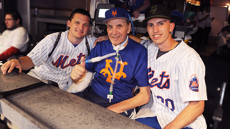 Gus enjoyed attending the game with his two grandsons.