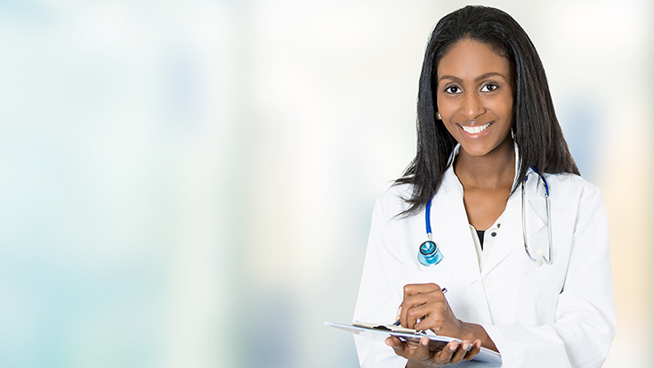 photo of female medical professional with stethescope holding clipboard