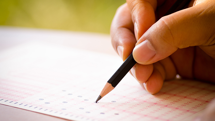 image of person filling out exam bubbles